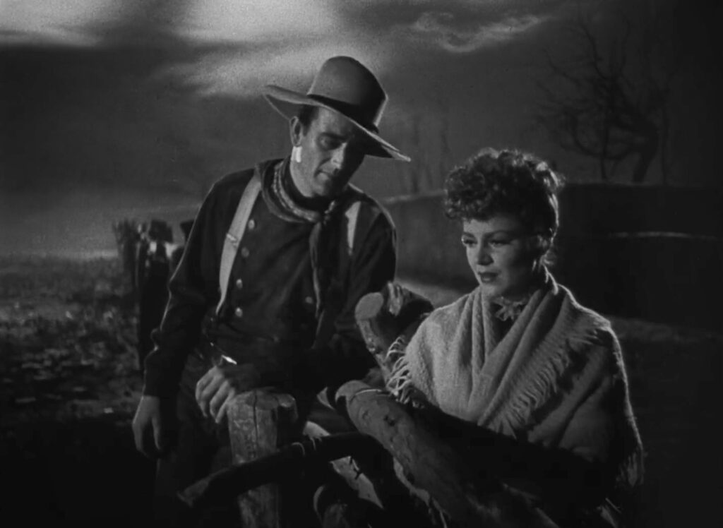 John Wayne e Claire Trevor em cena do filme "No tempo das diligências", de John Ford - Lumine TV