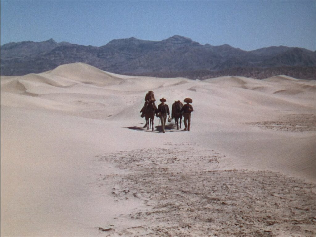 Harry Carey Jr., John Wayne e Pedro Armendáriz em cena do filme "O céu mandou alguém", de John Ford.