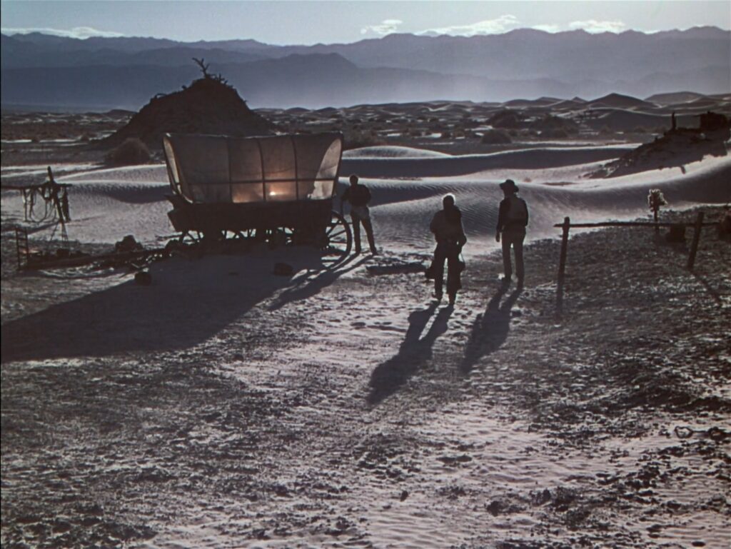 Harry Carey Jr., John Wayne e Pedro Armendáriz em cena do filme "O céu mandou alguém", de John Ford.